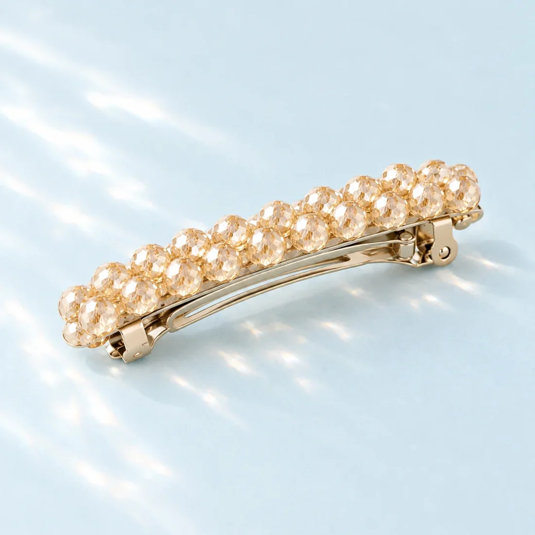 Champagne Barrette, clip base close-up