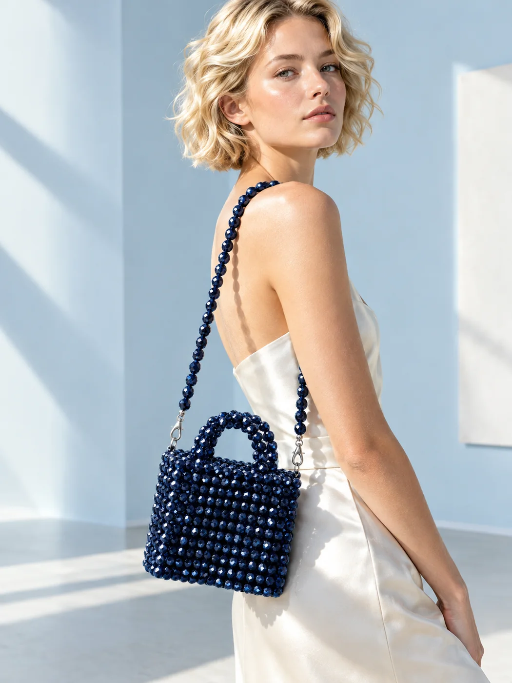 Midnight Bag Strap, clipped to a bag and worn