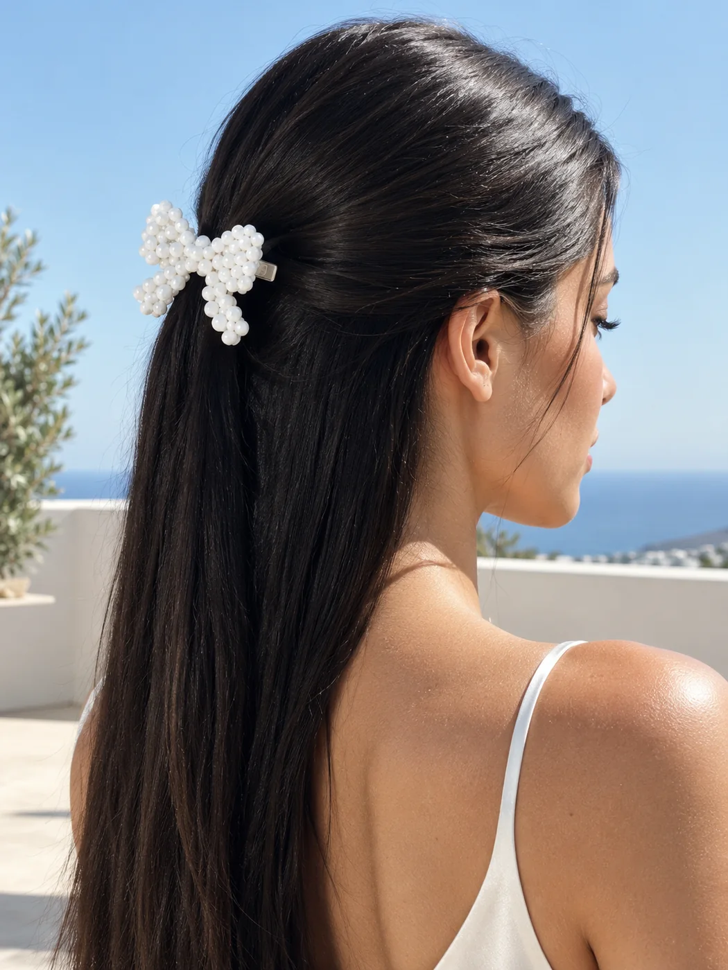 Milk Bow Clip, worn in the hair